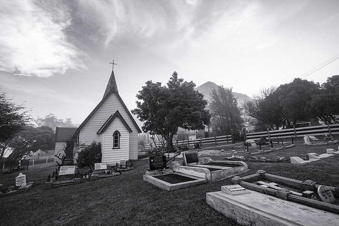 black and white photo of the exterior of a church demonstrating the use of tone in photography 