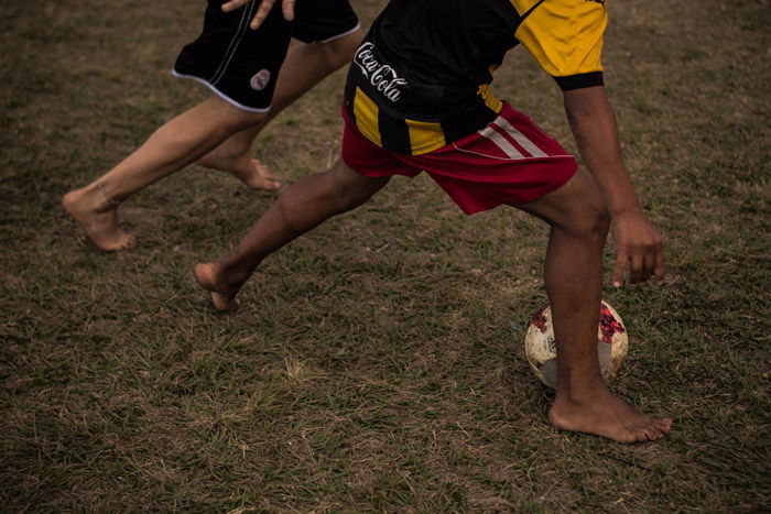 A soccer photography shot of players on the field