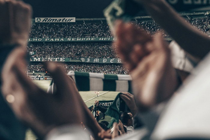 A soccer photography shot of a stadium full of fans 