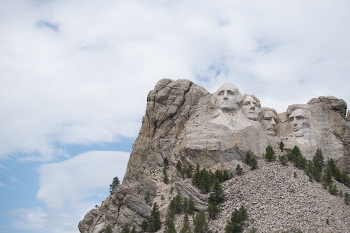 mount Rushmore on a cloudy day, utilizing dynamic range in photography 