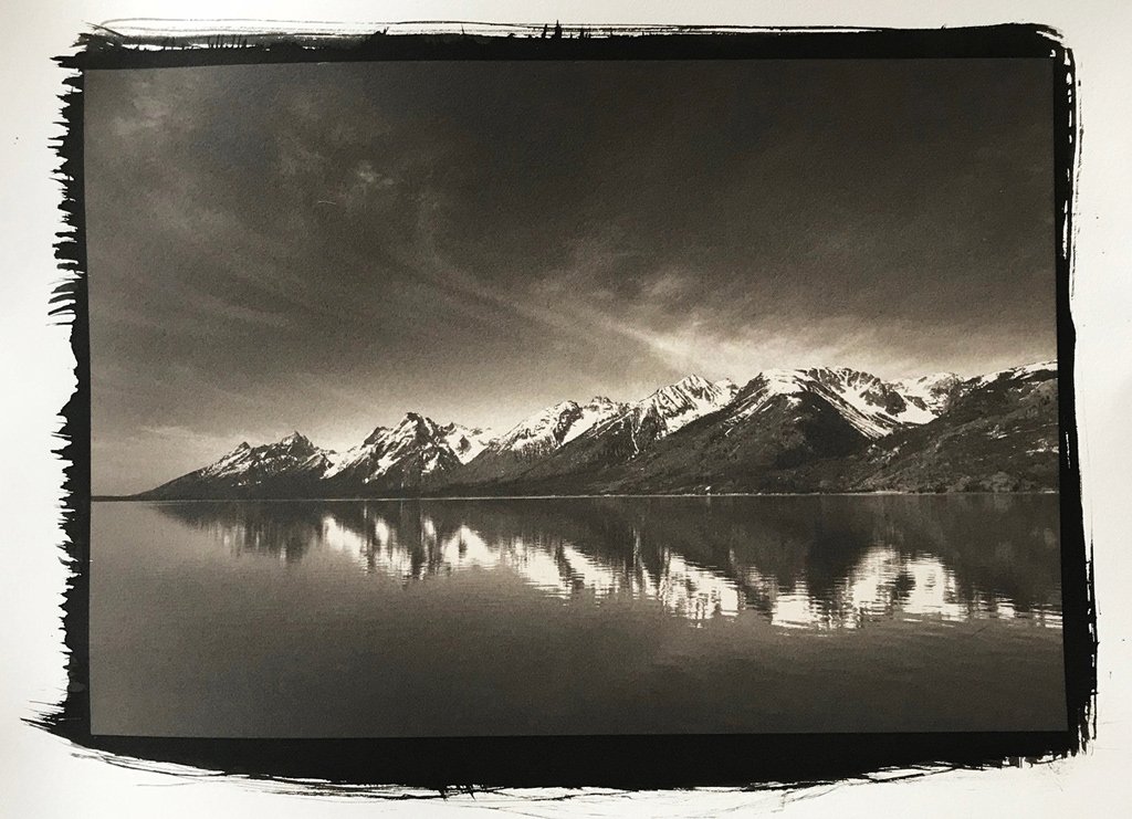 Alternative photography palladium print of a mountain and water landscape