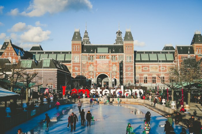 The I Amsterdam sign with the towering Rijksmuseum in the background 
