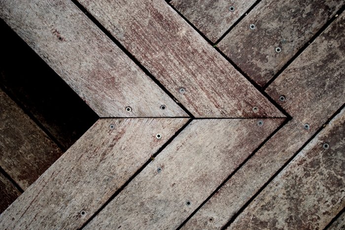 a photo of wooden floorboards with increased clarity to emphasize the wood texture - clarity tool lightroom