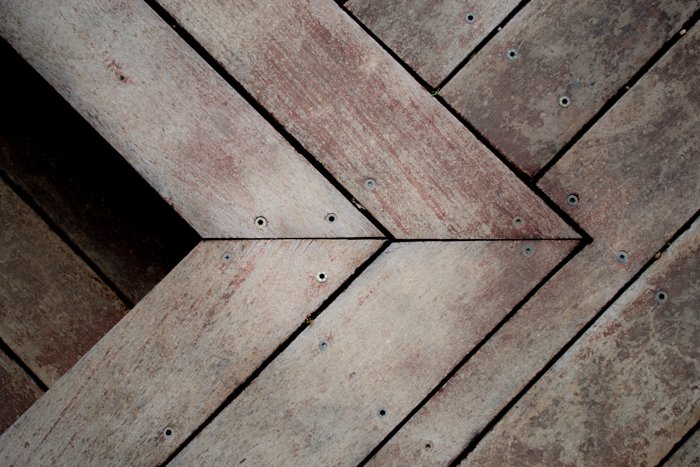 a photo of wooden floorboards with decreased clarity to blur the wood texture - clarity tool lightroom