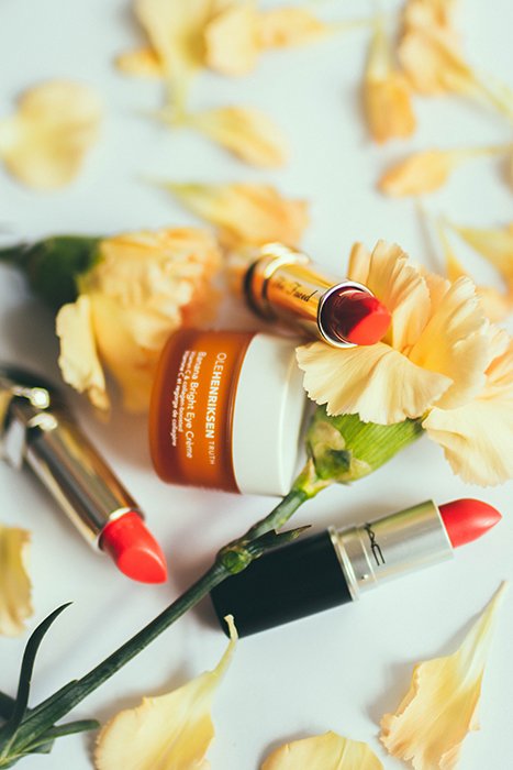 A floral themed cosmetic product photography shot - makeup photography tips