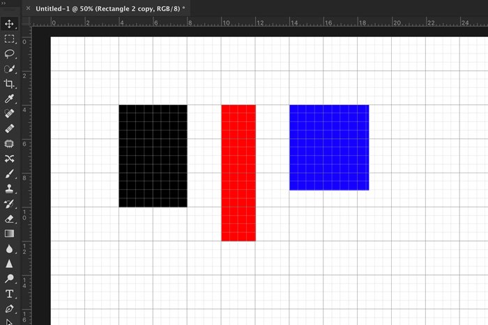 A screenshot showing colored shapes among Photoshop grid lines
