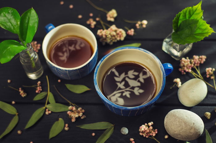 a creative still life featuring a cool reflection in a coffee cup