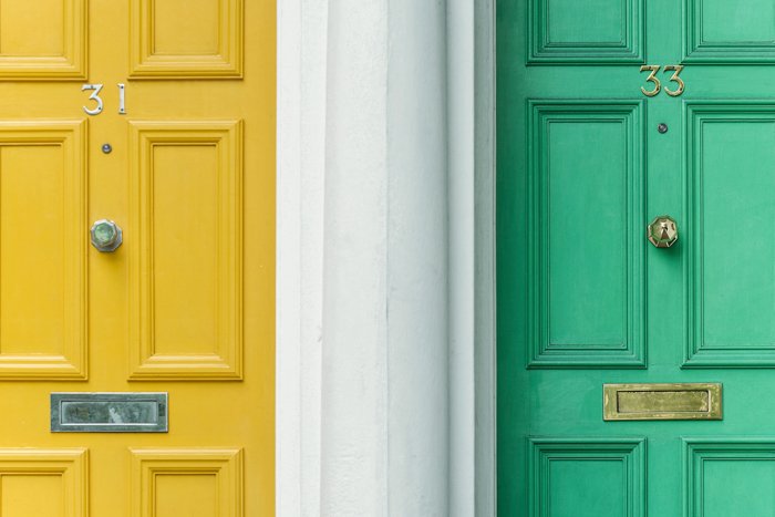 image of two doors; one yellow and one green