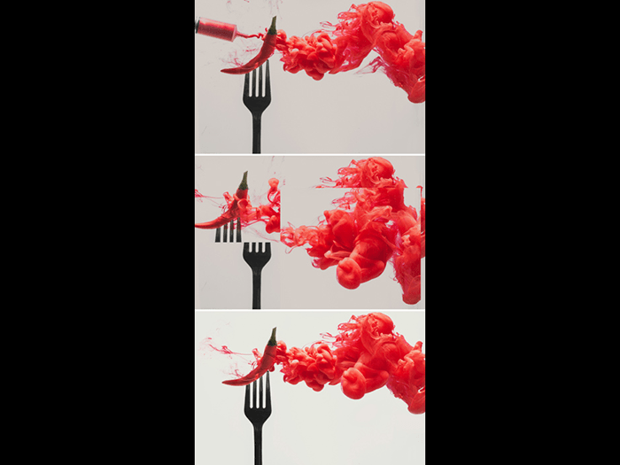 A triptych of combining photos of an underwater chili pepper on a fork setup for colorful paint in water photography