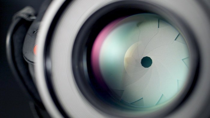close up of a camera aperture - prime lens tips
