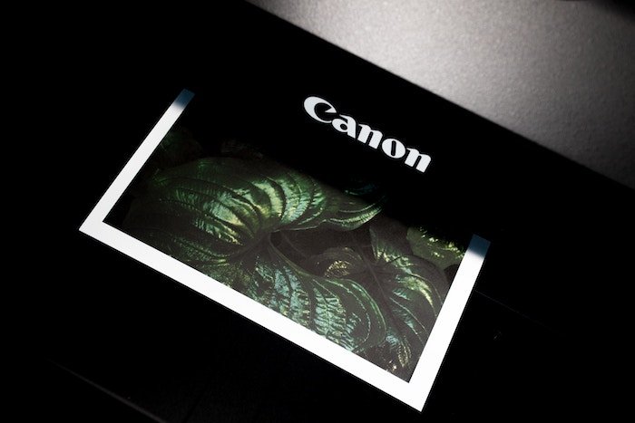 a photo being printed with a canon printer