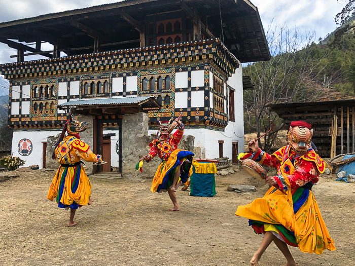 A freeze motion photography shot of traditional dancers in costume