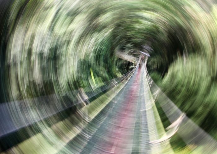 abstract blurry photo of an outdoor tunnel