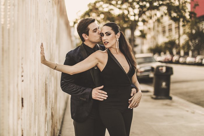 Photo of a couple posing on a street