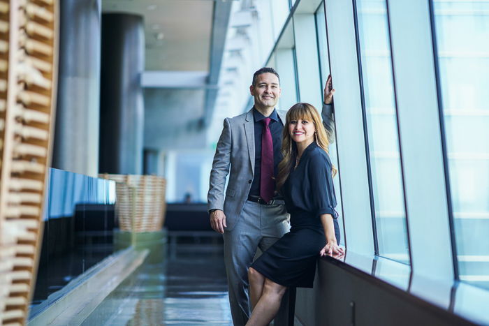 Photo of people posing in an office building