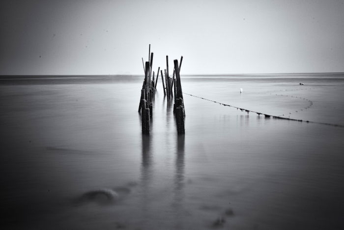 Long exposure photo of a waterscape in black and white