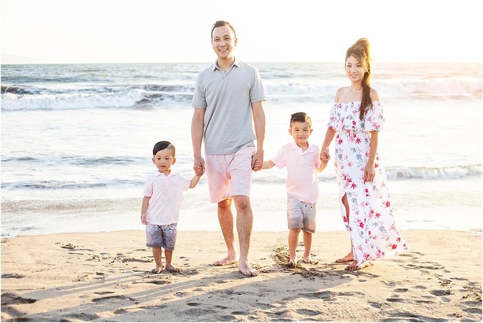 Classic-style family photo on the beach by William Branson