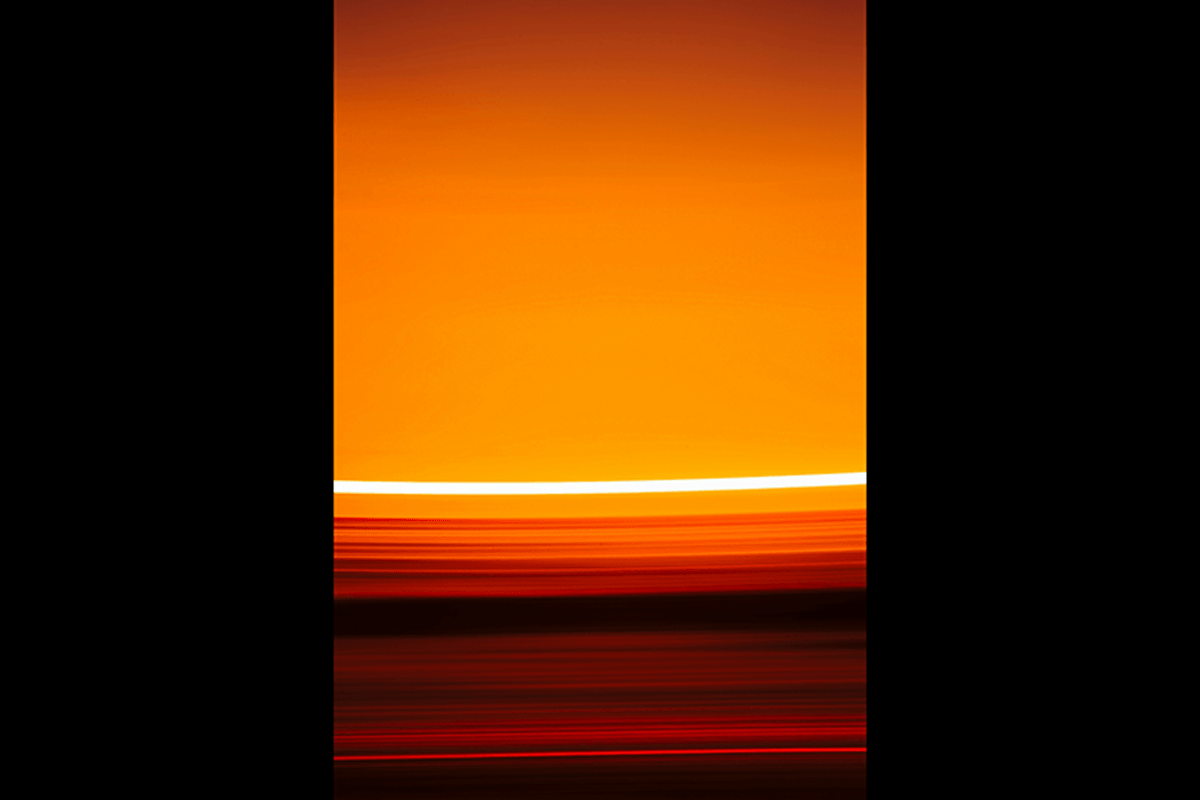 An abstract sunset made with an intentional camera movement pan