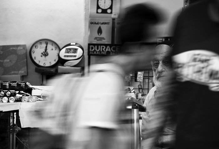 Motion blur photo of people at a shop