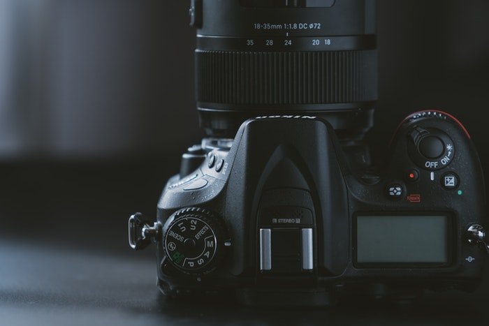 Close-up photo of the top of a Nikon camera