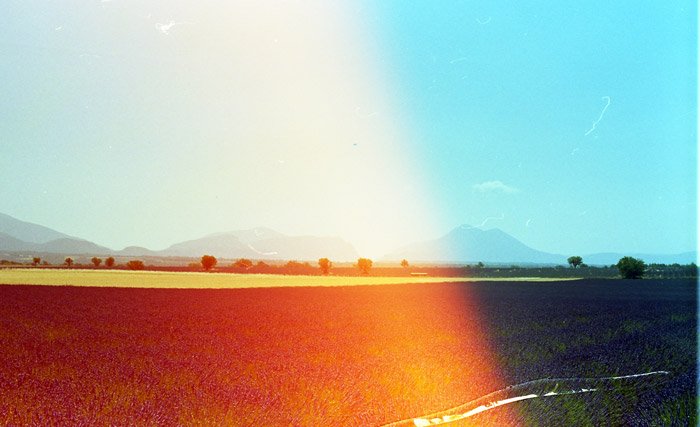 Photo of a landscape with the left side of the photo in red hue