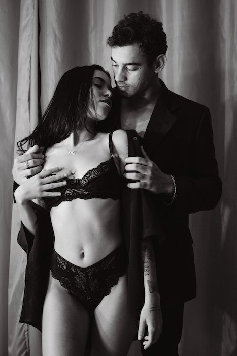 A couple posing for boudoir photography
