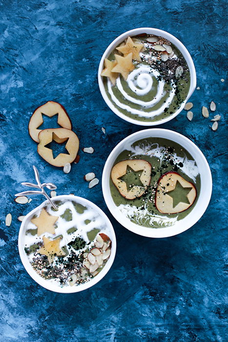 Photo of three bowls of cream on a blue table - food photography