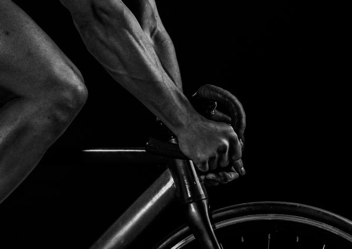 Close-up black an white photo of a cyclist