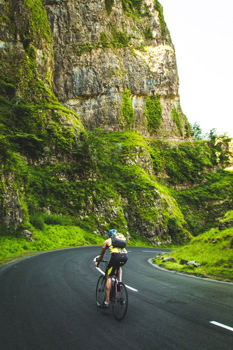 Photo of a man cycling in the mountains