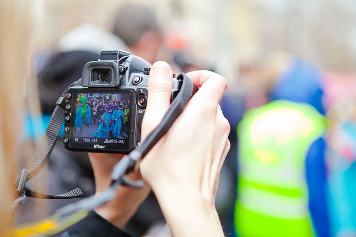 an outdoor event being shot through a digital camera