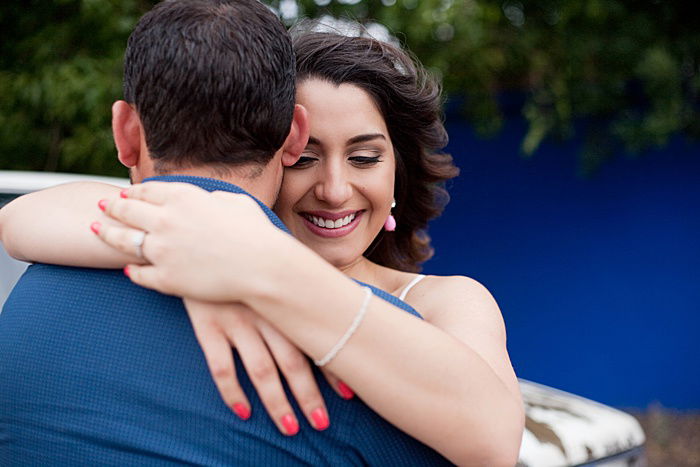 A couple embracing, shot from over the shoulder 