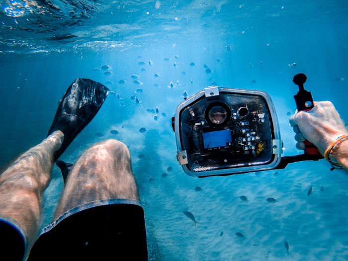 A GoPro camera being used underwater 