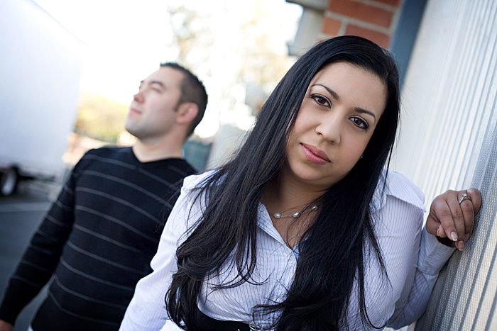 a portrait of a couple trying creative engagement photo poses