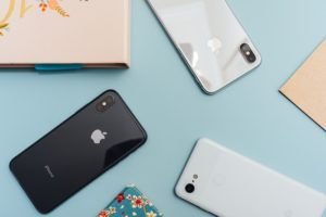 Overhead photo of different iPhones
