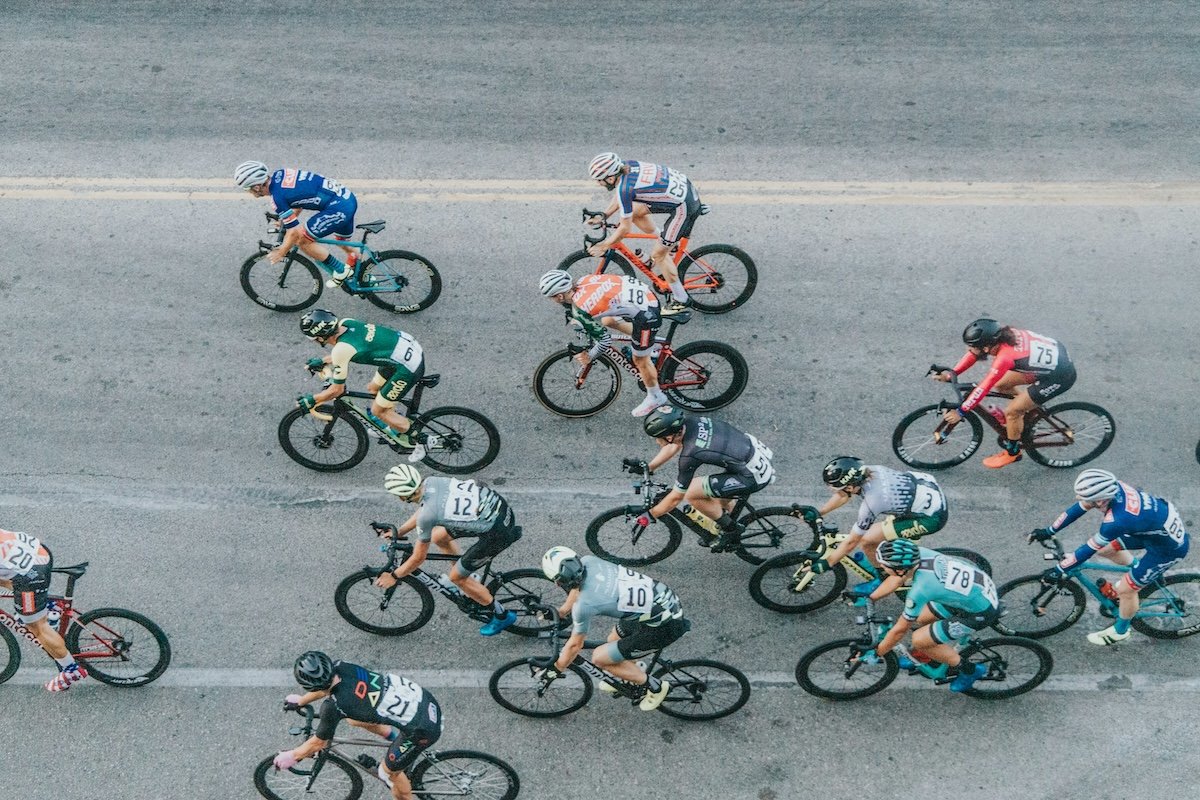 A group of road race cyclists shot for a birds-eye-view from above