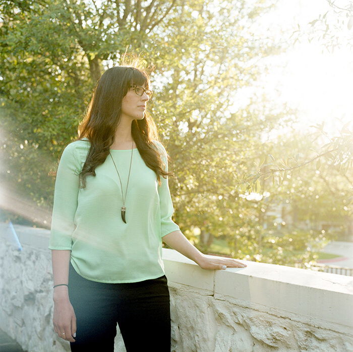 Portrait photo of a woman at a park