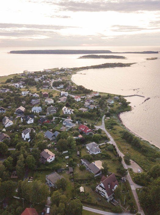 Drone photo of houses shot at sunset