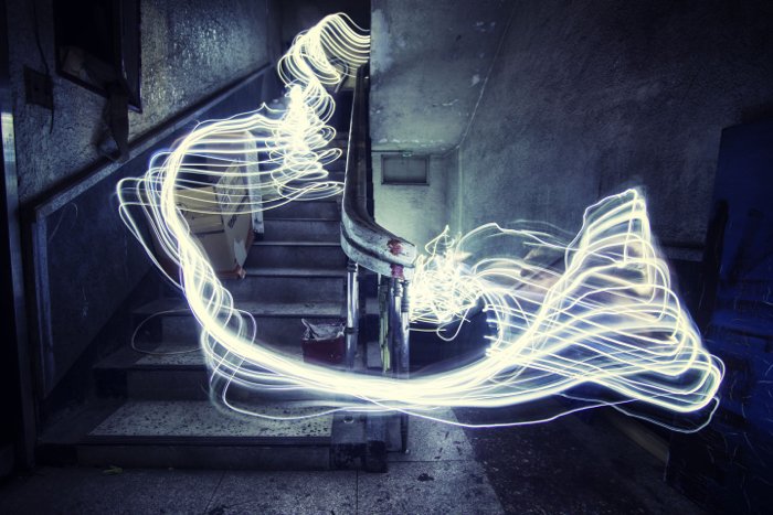 cool light painting in an abandoned industrial space for urban exploration