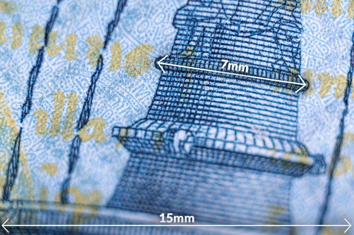 A macro shot of a tiny section of the Hungarian 1000 HUF banknote