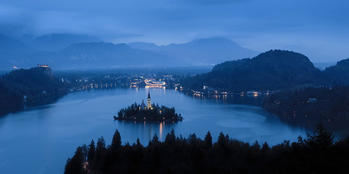 an island in a lake at night