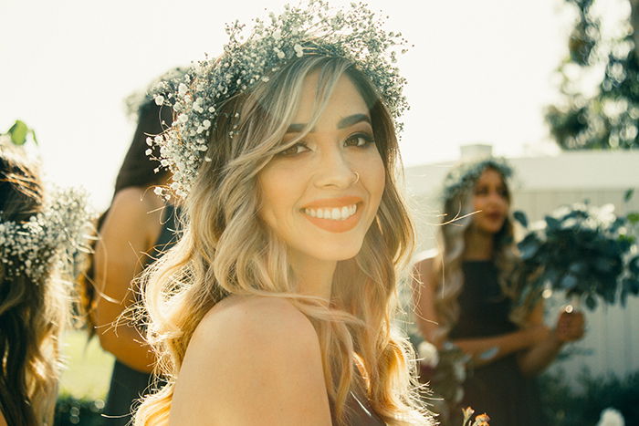 A girl with a floral wreath in her hair 