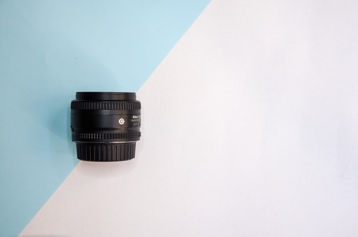 Zoom lens on a pastel background 