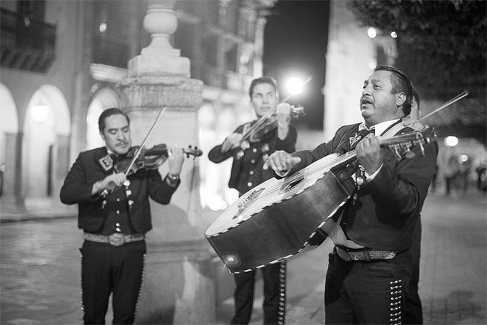 Black and white street portrait of a Mariachi band 