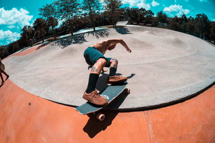 Photo of a guy doing a skateboard trick