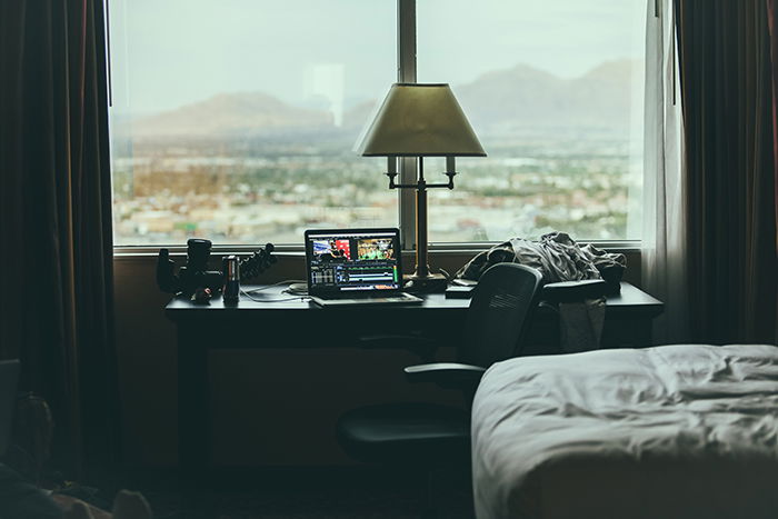 Photo of a desk in front of a window