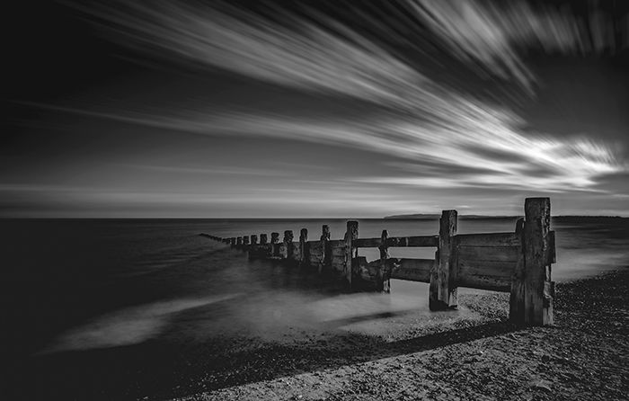 A black and white beach scene