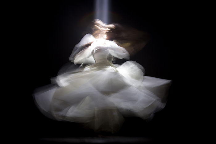 blurry portrait of a girl in white dress