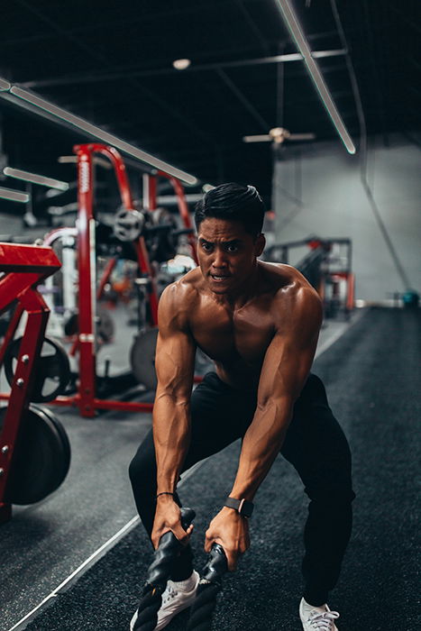 Beautiful athletic girl poses in the gym with a yellow shaker stock photo  (154051) - YouWorkForThem