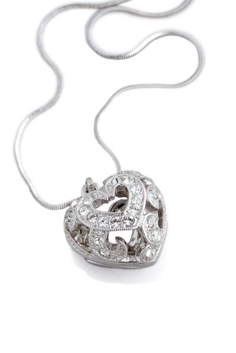 a silver necklace with a huge, heart-shaped medal on white background