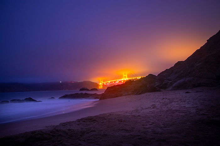 a beautiful beach in low light